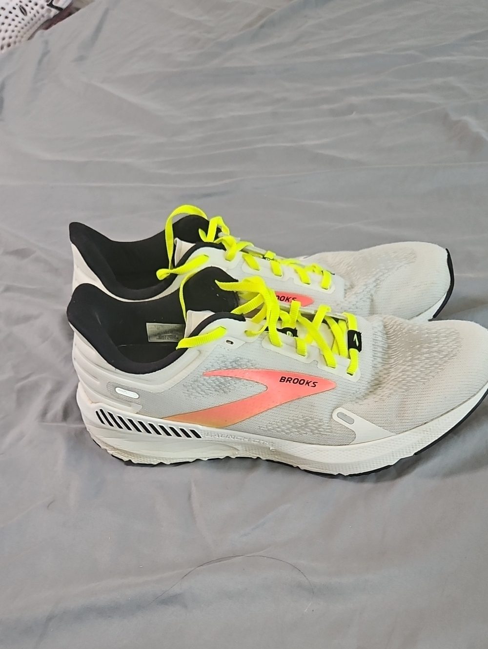 Brooks Mens White Running Shoes with Neon Yellow Laces and Coral Logo